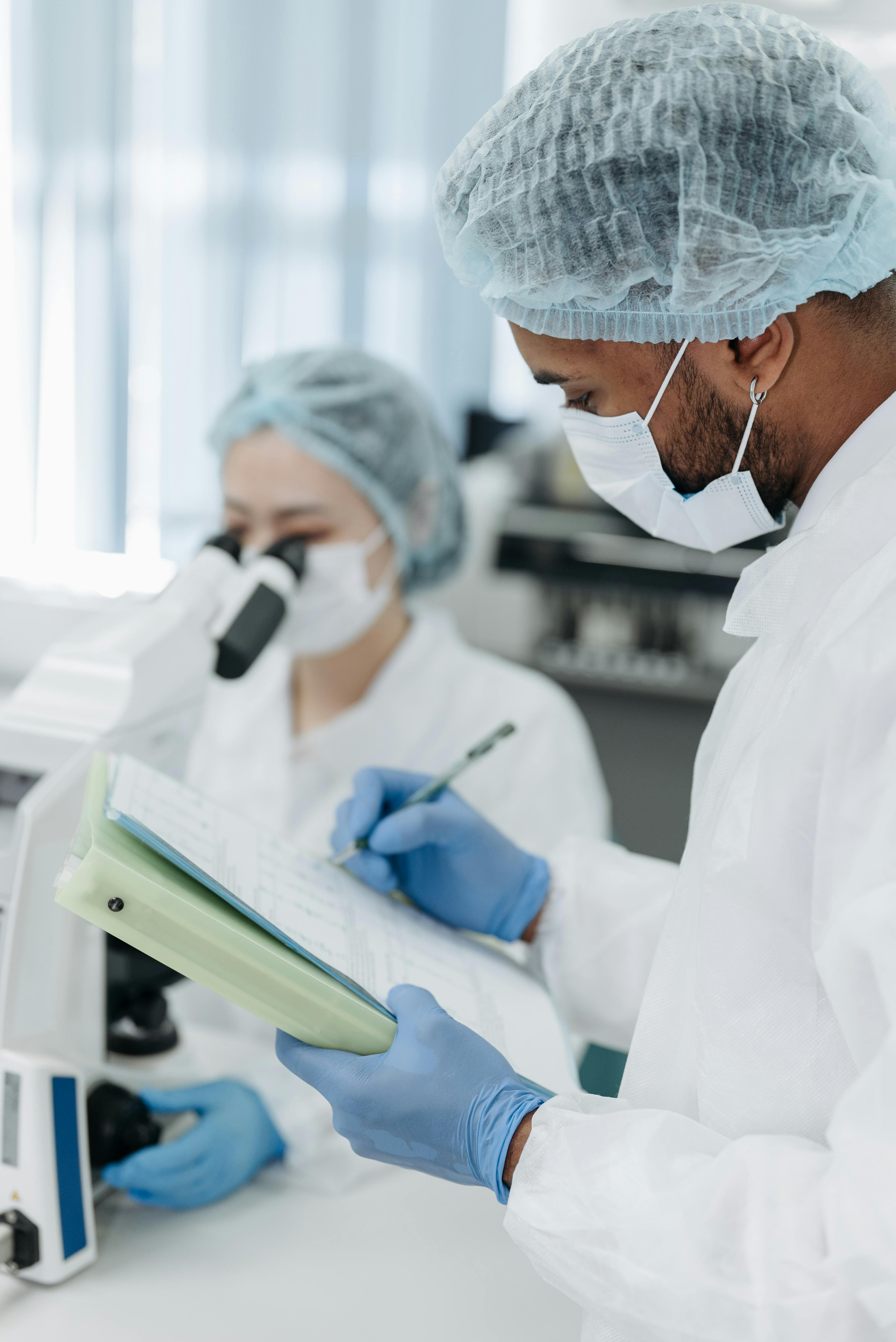 Lab technicians examining samples